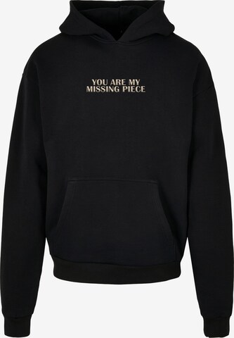 Merchcode Sweatshirt 'Missing Piece' in Zwart: voorkant