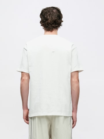 Nike Sportswear T-Shirt 'ESS' in Weiß