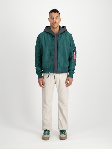 ALPHA INDUSTRIES Átmeneti dzseki 'MA-1 TT' - zöld