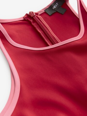 Next - Jumpsuit en rojo