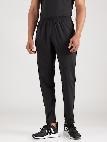 Effilé Pantalon de sport 'Own The Run' ADIDAS PERFORMANCE en noir : devant