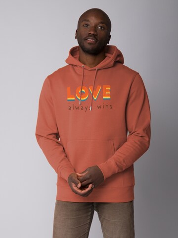 Watapparel Sweatshirt 'Love always wins' in Oranje: voorkant