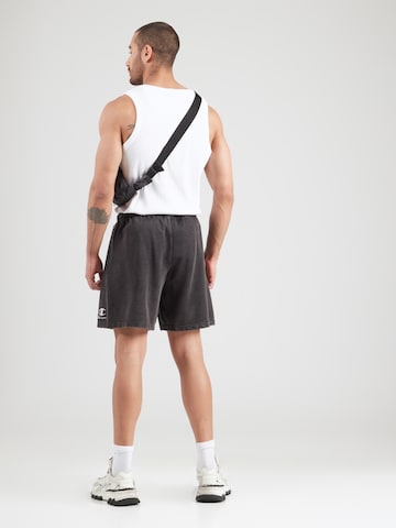 Loosefit Pantaloni di Champion Authentic Athletic Apparel in nero