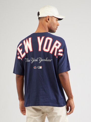 Champion Authentic Athletic Apparel - Camisa em azul