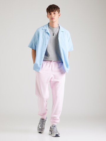Nike Sportswear Tapered Trousers 'CLUB' in Pink