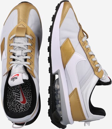 Nike Sportswear Sneaker in Gold