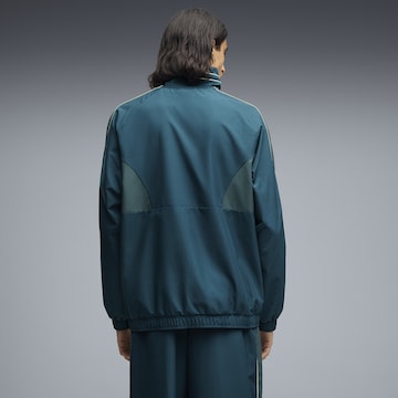 PUMA Sportjacke 'T7' in Blau