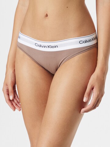 Slip de la Calvin Klein Underwear pe bej: față