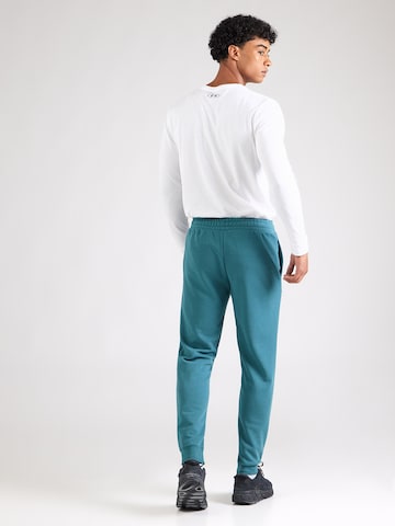 PUMA Tapered Urheiluhousut 'ESS No. 1' värissä vihreä