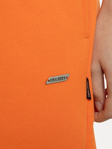 Effilé Pantalon Smilodox en orange