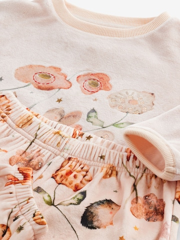 Pigiama di Next in beige
