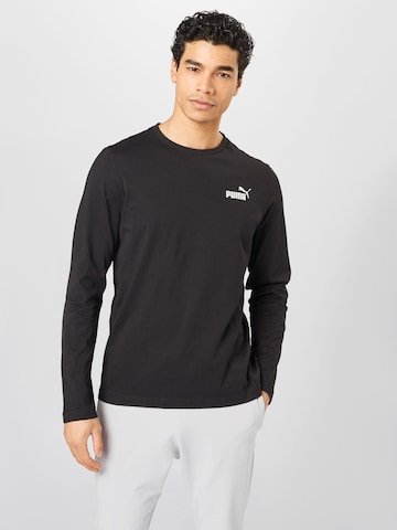 PUMA - Camiseta en negro: frente