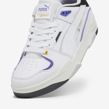 Baskets basses 'Slipstream' PUMA en blanc