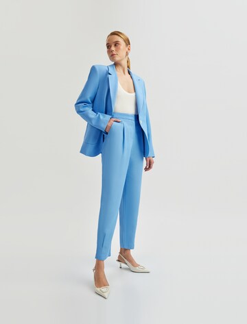 Koton Tapered Pleat-front trousers in Blue