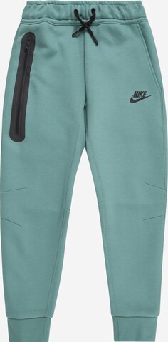 Nike Sportswear Tapered Housut 'TECH FLC' värissä vihreä: edessä