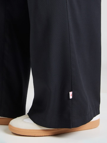 Blutsgeschwister - Perna larga Calças 'Power Walker' em preto