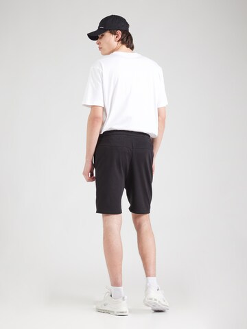 Hummel Regular Sports trousers 'ICONS' in Black