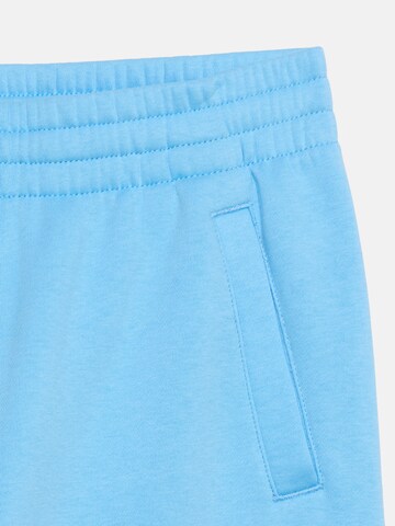 Effilé Pantalon 'CLUB FLC' Nike Sportswear en bleu