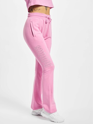 ADIDAS ORIGINALS Rozkloszowany krój Spodnie w kolorze różowy