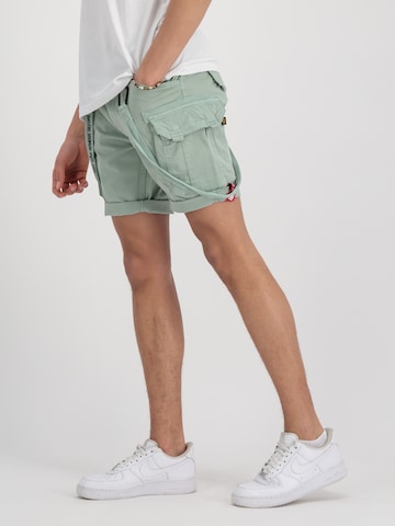 Effilé Pantalon cargo ALPHA INDUSTRIES en vert