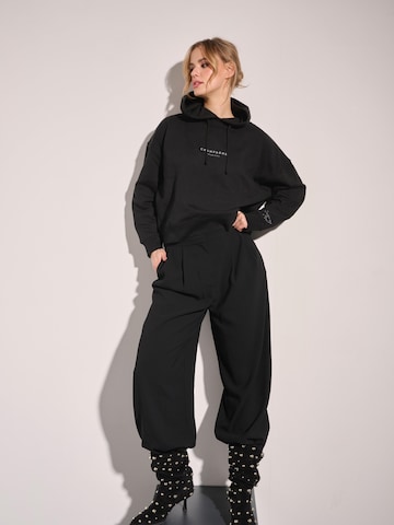 I want the moon Sweater 'Champagne Problems' in Black