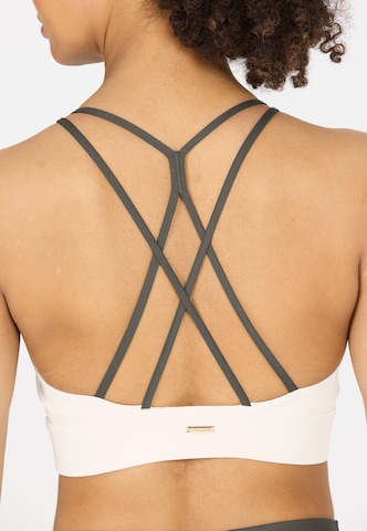 Athlecia Low Support Sports bra 'Aspasia' in Brown