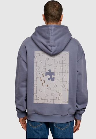 Merchcode Sweatshirt 'Missing Piece' in Blue: front