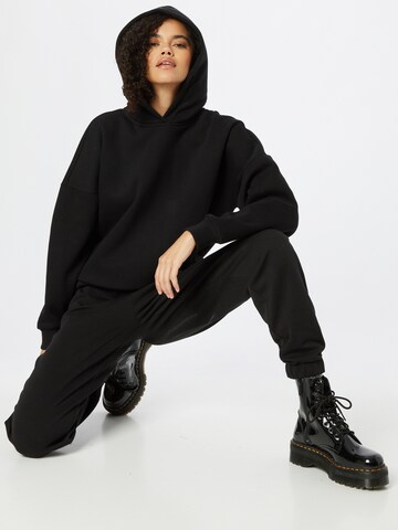 ABOUT YOU x INNA Sweatshirt 'Alessia' in Black
