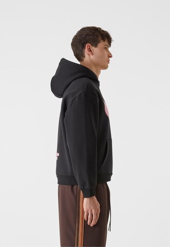 Lost Youth Sweatshirt 'Wild Room Service' in Schwarz