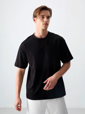 Tommy Life T-Shirts in Schwarz
