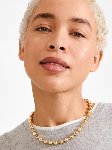 Chaîne 'Air' Pilgrim en or : devant