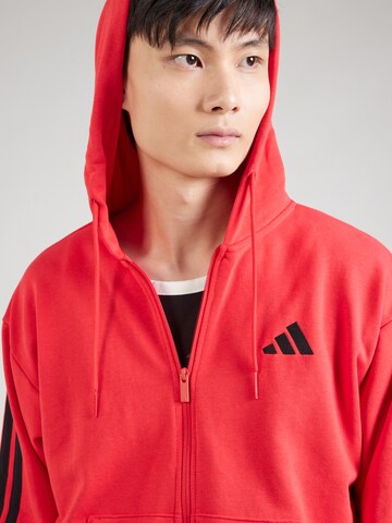ADIDAS SPORTSWEAR Αθλητική ζακέτα φούτερ 'Essentials' σε κόκκινο