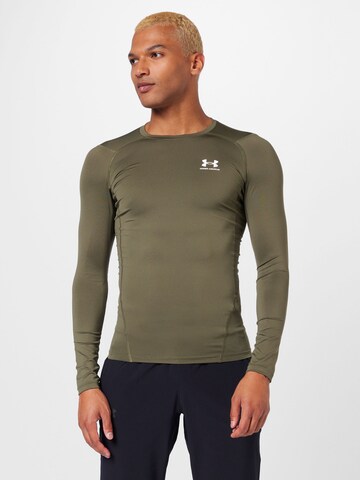 UNDER ARMOUR Koszulka funkcyjna w kolorze zielony: przód