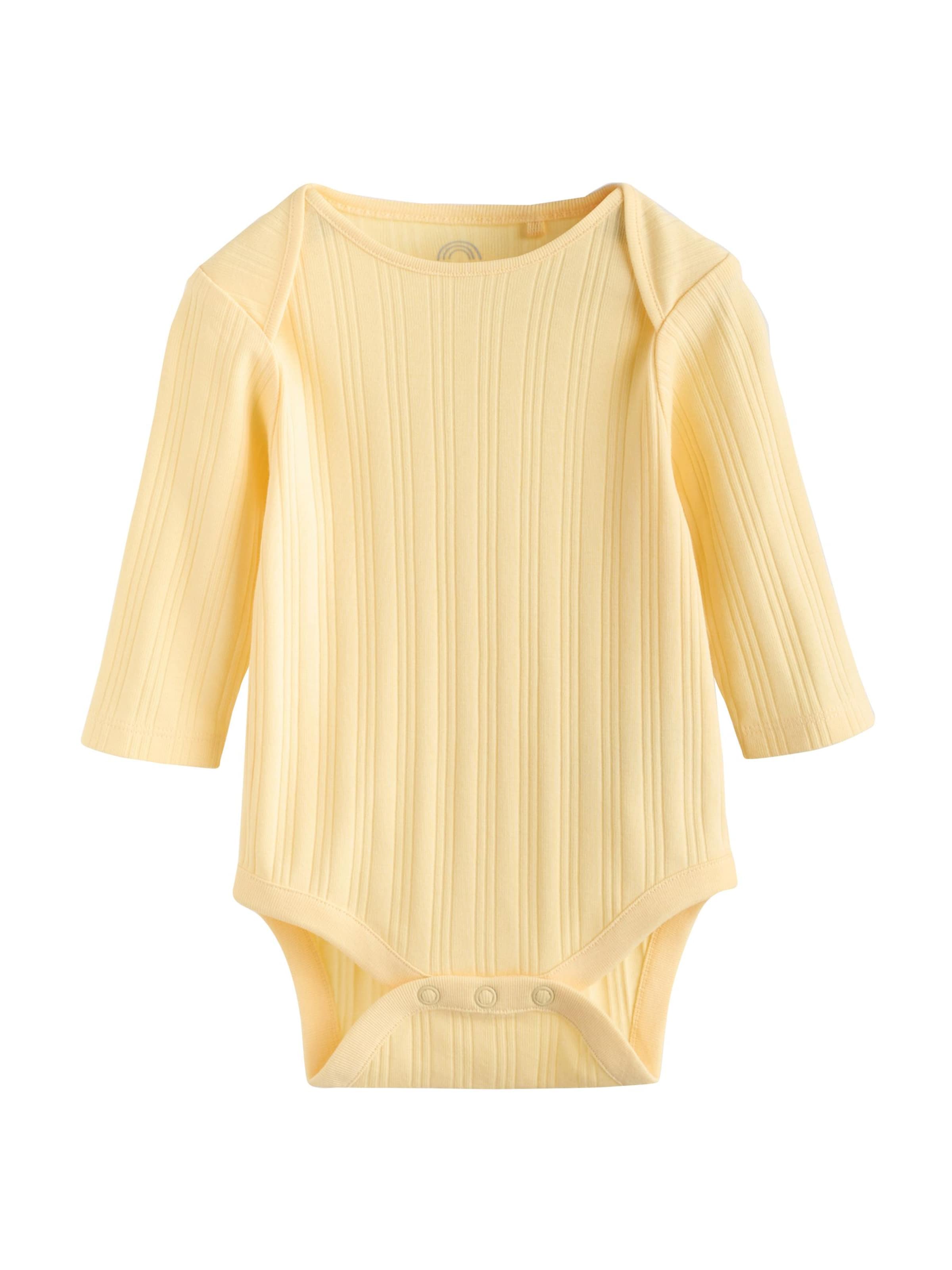 Next - Pijama entero/body en amarillo