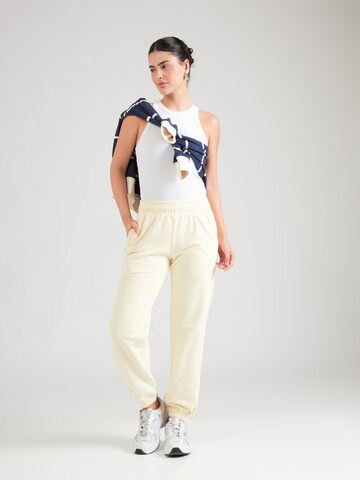 ELLESSE Tapered Pants 'LENTELLA' in Yellow