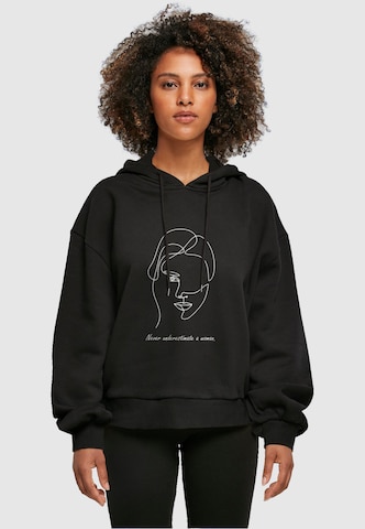Merchcode Sweatshirt 'WD - Woman Figure' in Schwarz: predná strana