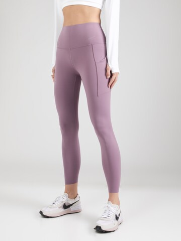 Skinny Pantalon de sport 'UNIVERSA' NIKE en violet : devant