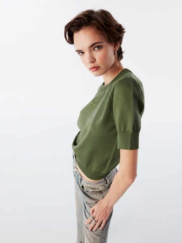 Pull-over Twist en vert