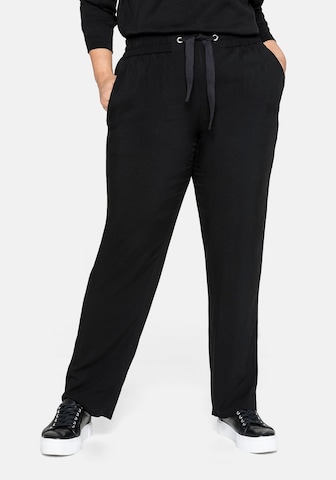 SHEEGO Slim fit Pants in Black: front