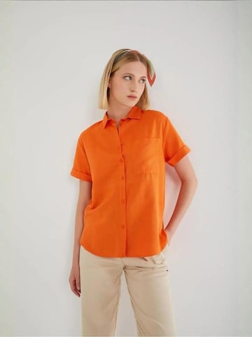 Maglietta di MixRay in arancione: frontale