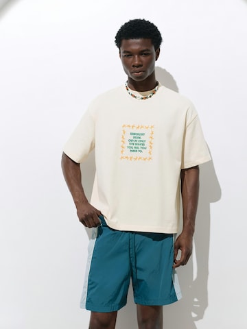 Pull&Bear Koszulka 'STWD COMMUNITY TRIPLE STAR' w kolorze beżowy: przód