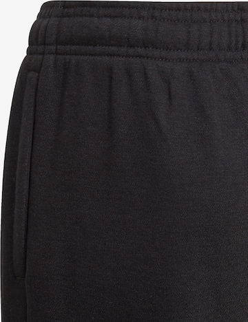 ADIDAS SPORTSWEAR Tapered Παντελόνι φόρμας 'Essentials French Terry' σε μαύρο