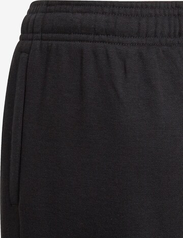 Tapered Pantaloni sportivi 'Essentials French Terry' di ADIDAS SPORTSWEAR in nero