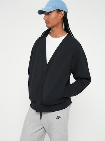 Regular Pantaloni 'TECH FLC' de la Nike Sportswear pe gri