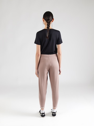 PUMA - Tapered Pantalón deportivo 'CLASS' en beige