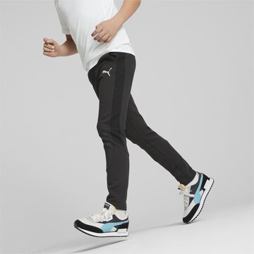 PUMA Slim fit Workout Pants in Black: front