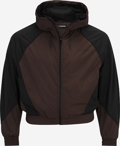 Han Kjøbenhavn Välikausitakki värissä ruskea / musta, Tuotenäkymä