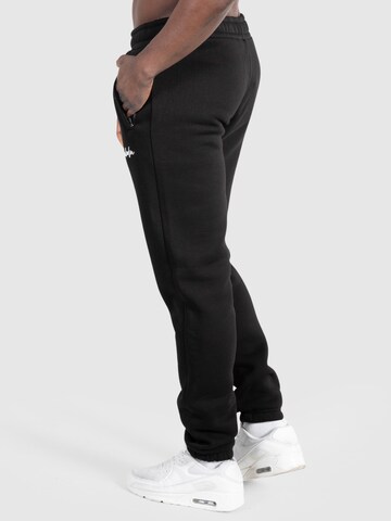 Effilé Pantalon 'Kane' Smilodox en noir