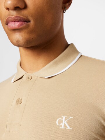 Calvin Klein Jeans Koszulka w kolorze beżowy