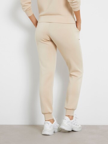 GUESS Regular Workout Pants in Beige